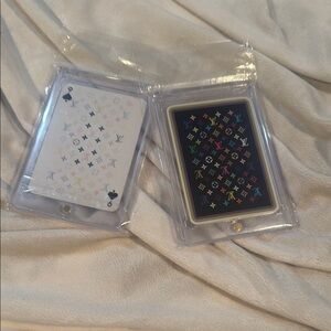 Louis Vuitton cards. Two of them.